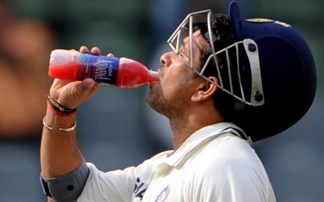 Cricket legend and former Indian batsman Sachin Tendulkar drinks an energy supplement while batting - but Saturday morning sport doesn't need extra energy or rehydration.