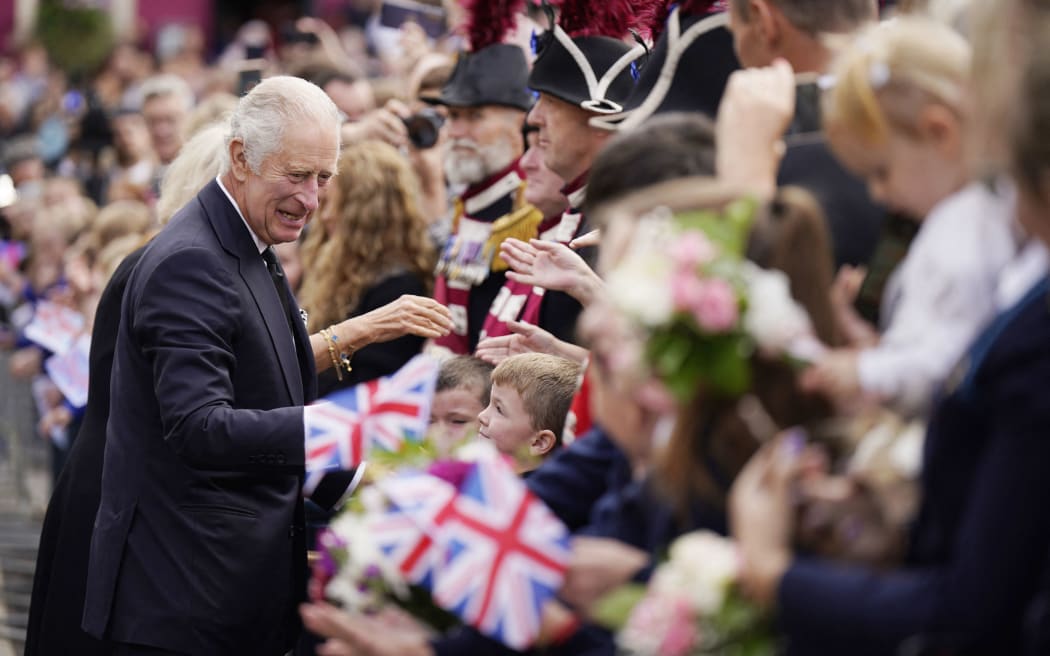 King Charles III meets members of the public during a walkabout in Belfast on 13 September, 2022, during his visit to Northern Ireland.