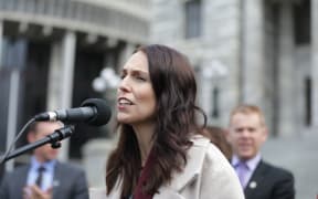 Prime Minister Jacinda Ardern speaks to striking teachers at Parliamen grounds.