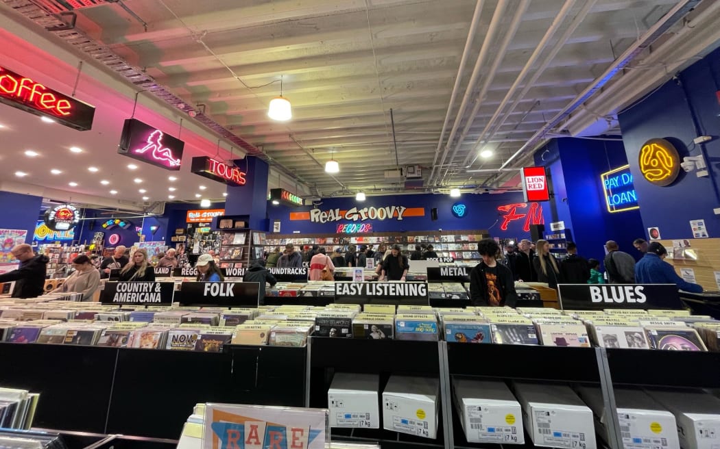 Punters dig in at Real Groovy in Auckland for Record Store Day 2024.