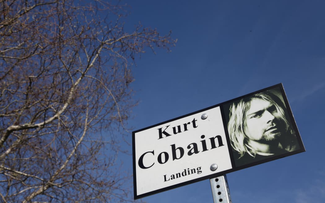 A sign in Kurt Cobain Park in Aberdeen, Washington on April 1, 2014. The park where Cobain used to hang out and write songs has become a symbol for fans as it was a gathering place after the news of his death spread. Nirvana fans prepare to mark the 20th anniversary of the iconic frontmans suicide on April 5.  AFP PHOTO / Sébastien VUAGNAT (Photo by Sebastian VUAGNAT / AFP)