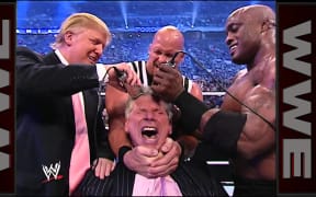 Donald Trump shaving the head of Vince McMahon in WWF's Battle of the Billionaires in 2007