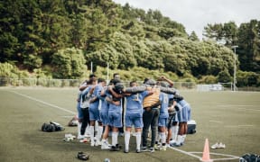 Wellington Lautoka FC huddle up ahead of their first group match in the 2021 Wellington B.O.G. tournament. March 2021