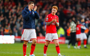 Chris Wood and Jack Colback of Nottingham Forest celebrate after the final whistle