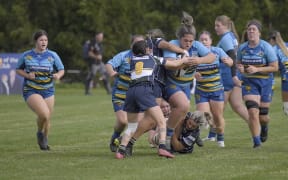Mereana Anderson makes a storming run for Clifton in the Taranaki women's rugby premiership.
