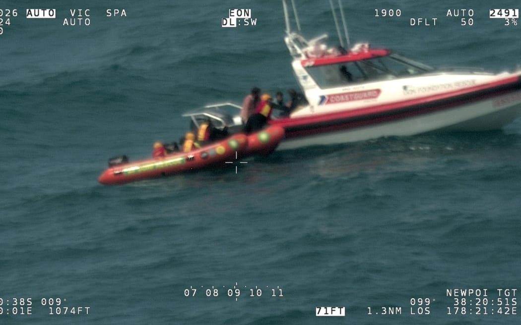 Three men spent six hours in the water off Tolaga Bay before a major search and rescue effort reached them.