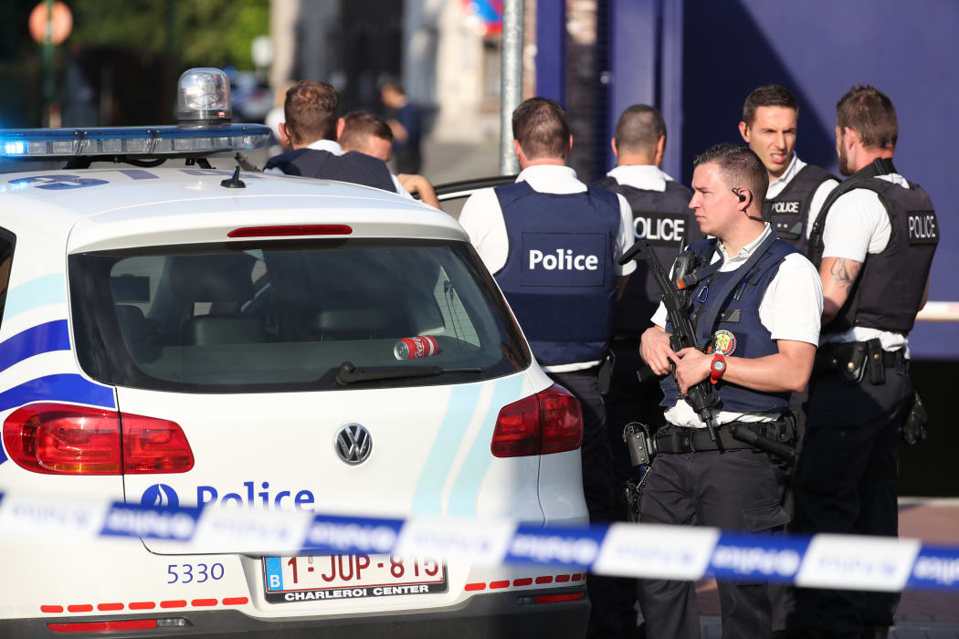 Police secure the area around a police building in Charleroi following the machete attack on 6 August 2016.