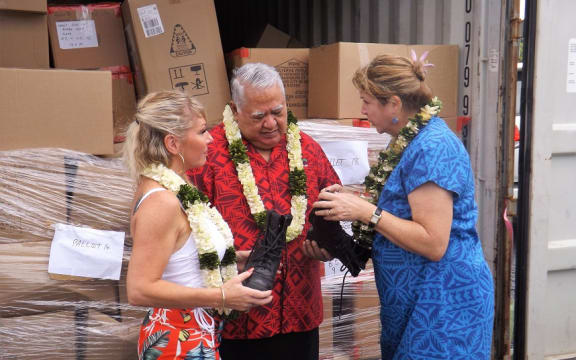 Australian policewoman donates boots to Samoan farmers