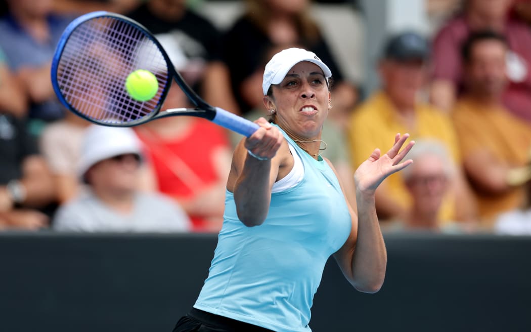 Madison Keys of the USA plays a forehand against Jaqueline Cristian of Romania.