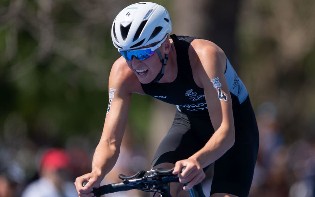 Dylan McCullough NZL cycling in the Men's Triathlon at the 2018 Youth Olympics.