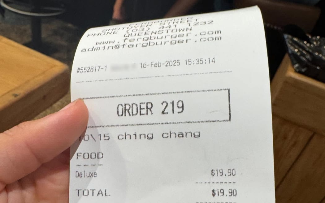 A customer says his receipt at famous restaurant Fergburger included a racial slur.