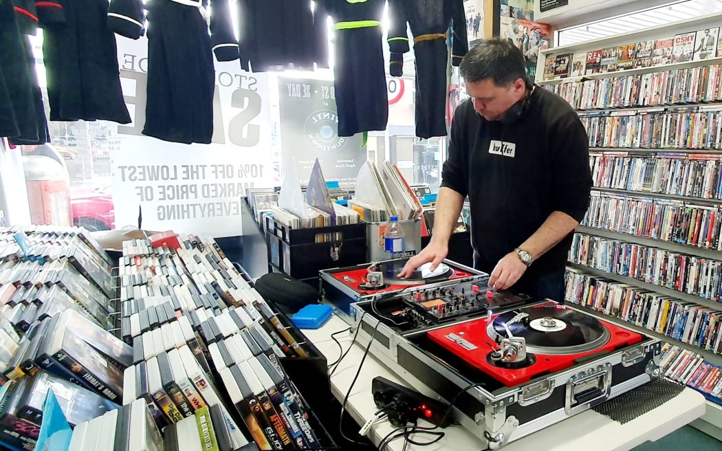 A DJ playing at Record Store Day at Vinyl Countdown.