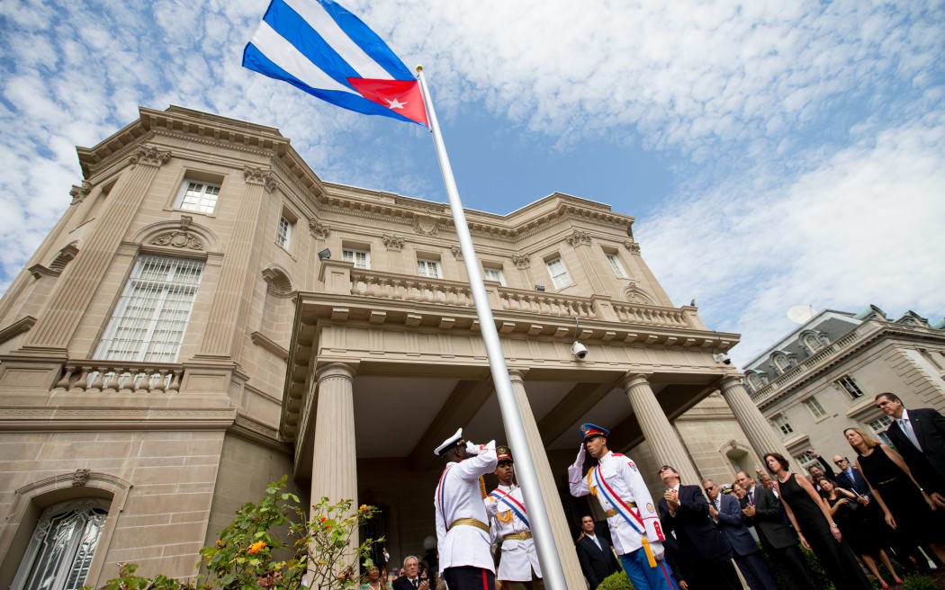 Cuba's flag is hoisted at the country's embassy in Washington DC.