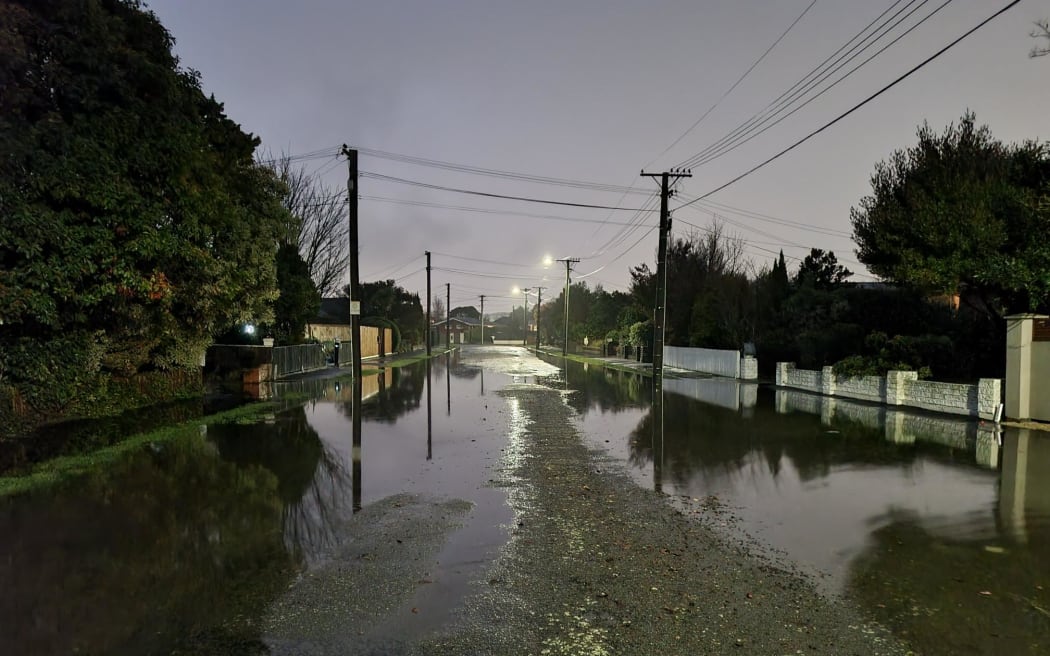 Greenpark Street in Hoon Hay on 26 July 2022, where residents say it's the worst flooding they've ever seen.