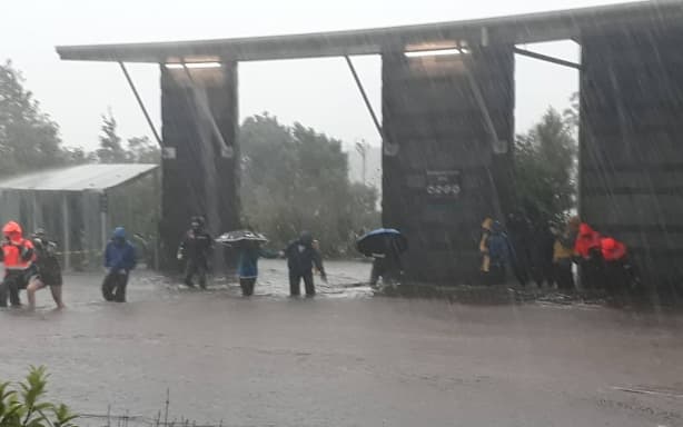 Floodwaters at the Milford Visitors Terminal on Monday.