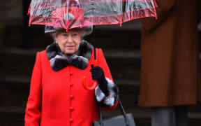 This file photo taken on December 25, 2015 shows Britain's Queen Elizabeth II attending a traditional Christmas Day Church Service at Sandringham in eastern England.