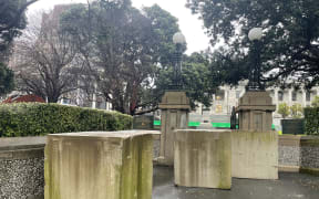 Fencing and bollards were being set up and roads closed around the parliamentary precinct on Wednesday 27 September 2023 ahead of planned protests.