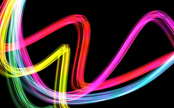 Curving waves of light in the colours of the rainbow