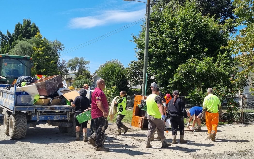 Volunteers clean up damage from Cyclone Gabrielle in Wairoa.