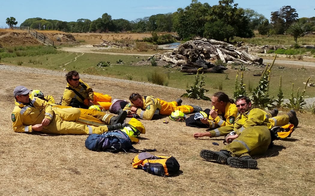 Firefighers from Ashburton wait to be deployed.