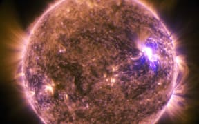 This NASA image obtained June 27, 2015 shows The sun as it emitted a mid-level solar flare, an M7.9-class, peaking at 4:16 a.m. EDT on June 25, 2015.