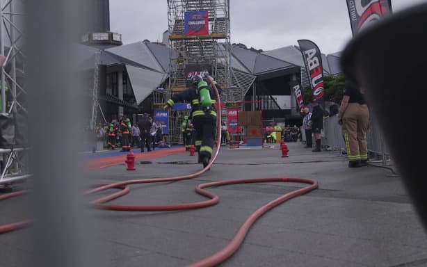'The toughest two minutes in sport' - Firefighters test their skills | RNZ