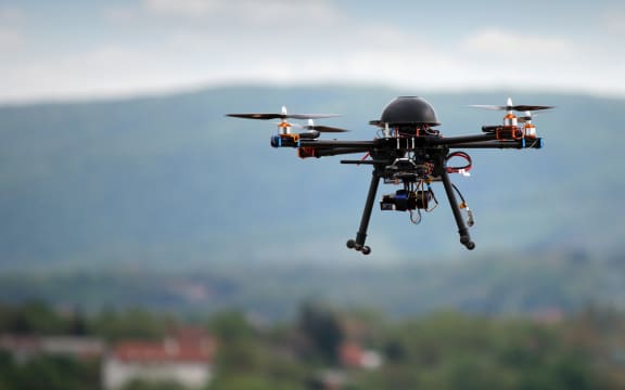 flying drone with camera on the sky