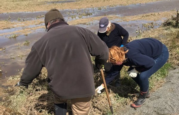 Locals volunteering with Southland Federated Farmers to help farmers in the aftermath of flooding across the region.