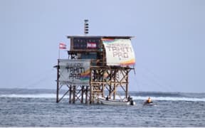 The existing wooden Judges Tower-b in Teahupoo.