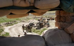 US troops at the Afghan National Army  checkpoint in Nerkh district of Wardak province west of Kabul in 2019.