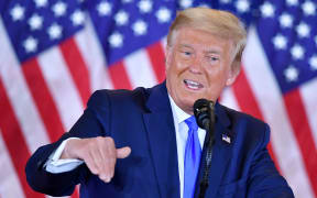 US President Donald Trump speaks during election night in the East Room of the White House in Washington, DC, early on November 4, 2020. (Photo by MANDEL NGAN / AFP)