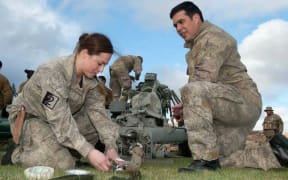 Pte Sheridan and Pte Marino secure a strop to a 105mm light field gun prior to uplift by a NH-90 helicopter during Ex Ben Cat which is a live firing exercise conducted by 16 Field Regiment, 161 Battery, in Waiouru from 12-20 September
