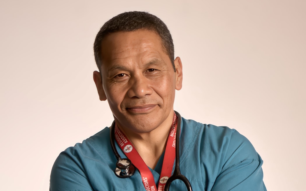 Dr Timoti Te Moke in scrubs.
