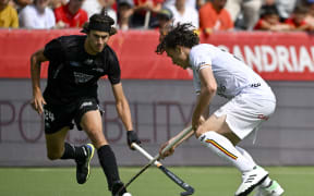 New Zealand's Sean Findlay (L) and Belgium's Arnaud Van Dessel compete during a hockey game between Belgian national team Red Lions and New Zealand, in the group stage of the 2023 Men's FIH Pro League in Antwerp on June 18, 2023. (Photo by DIRK WAEM / Belga / AFP) / Belgium OUT
