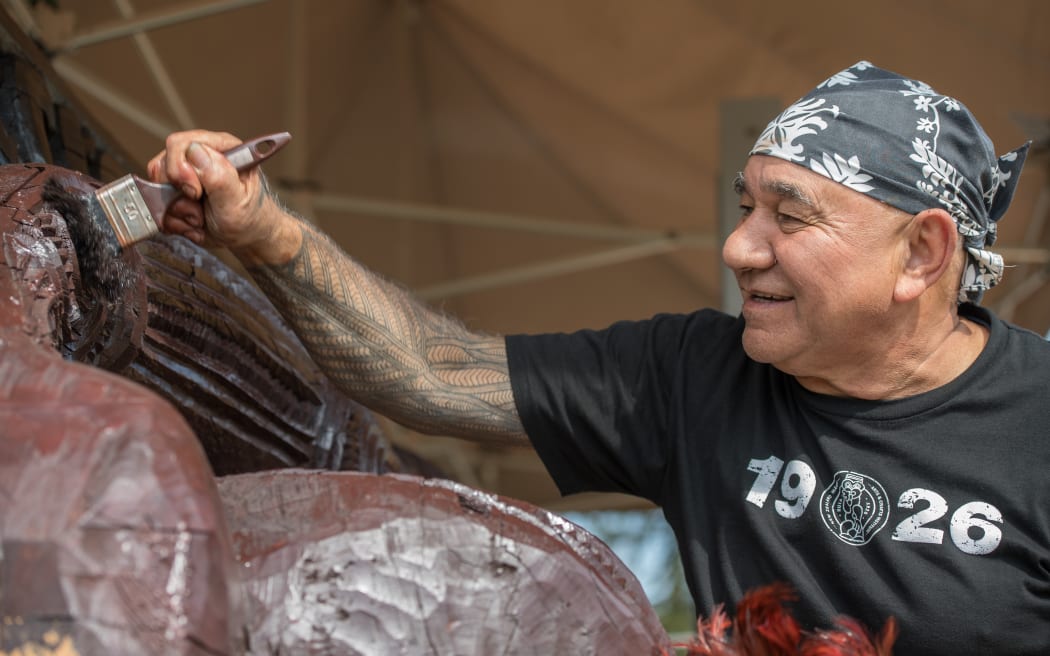 The pou maumahara was carved by master carver James Rickard along with tutors and students over four years.