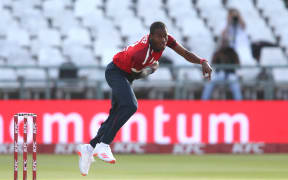 Jofra Archer of England sends down a delivery during a T20 International match between South Africa and England held at Newlands Cricket Ground in Cape Town, South Africa, 2020.