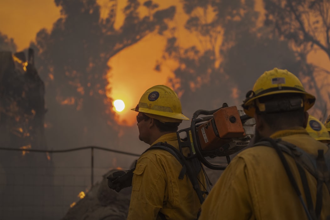 Firefighters battle the Alisal Fire near Goleta, California.