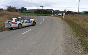Police at Mountain Road near Gore on Friday 16 August.