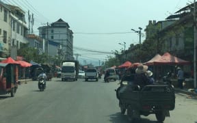 A shot of a village near Yunnan, China, where people are starting to come out after lockdown.