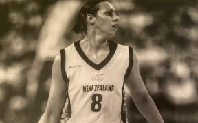 Megan competing in the Sydney 2000 games, photographed for a newspaper article.