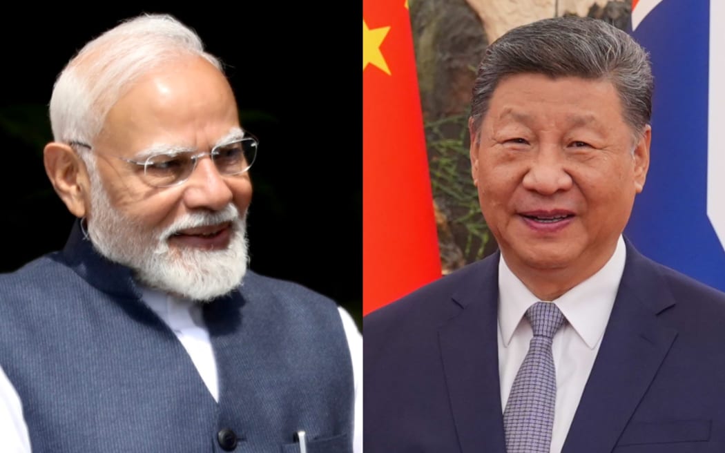 Indian Prime Minister Narendra Modi said New Delhi was committed to improving ties with Beijing in a key meeting with China's President Xi Jinping.
