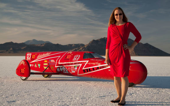 Engineer and racer Eva Hakansson with her motorcycle Killajoule, which holds the electric motorcycle speed world record.
