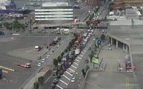 Trucks heading along Wellington's waterfront as part of the protest convoy on its way to Parliament.