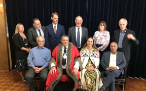 Kaipara Mayor Craig Jepson (centre in red robe) alongside Te Moananui Māori Ward councillor Pera Paniora.