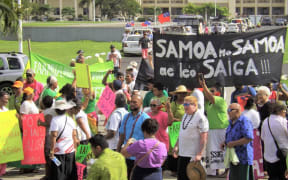 Around 100 people protested outside Samoa's parliament