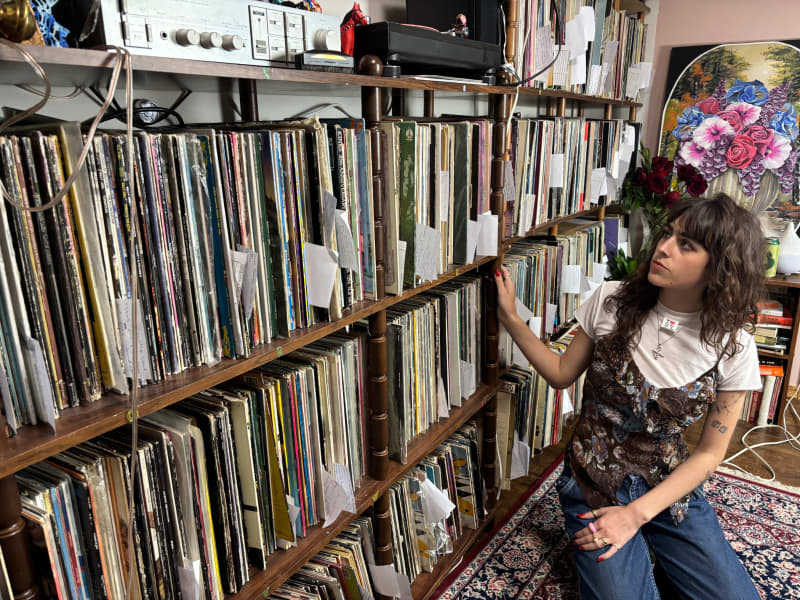 Jula with her dad's record collection.