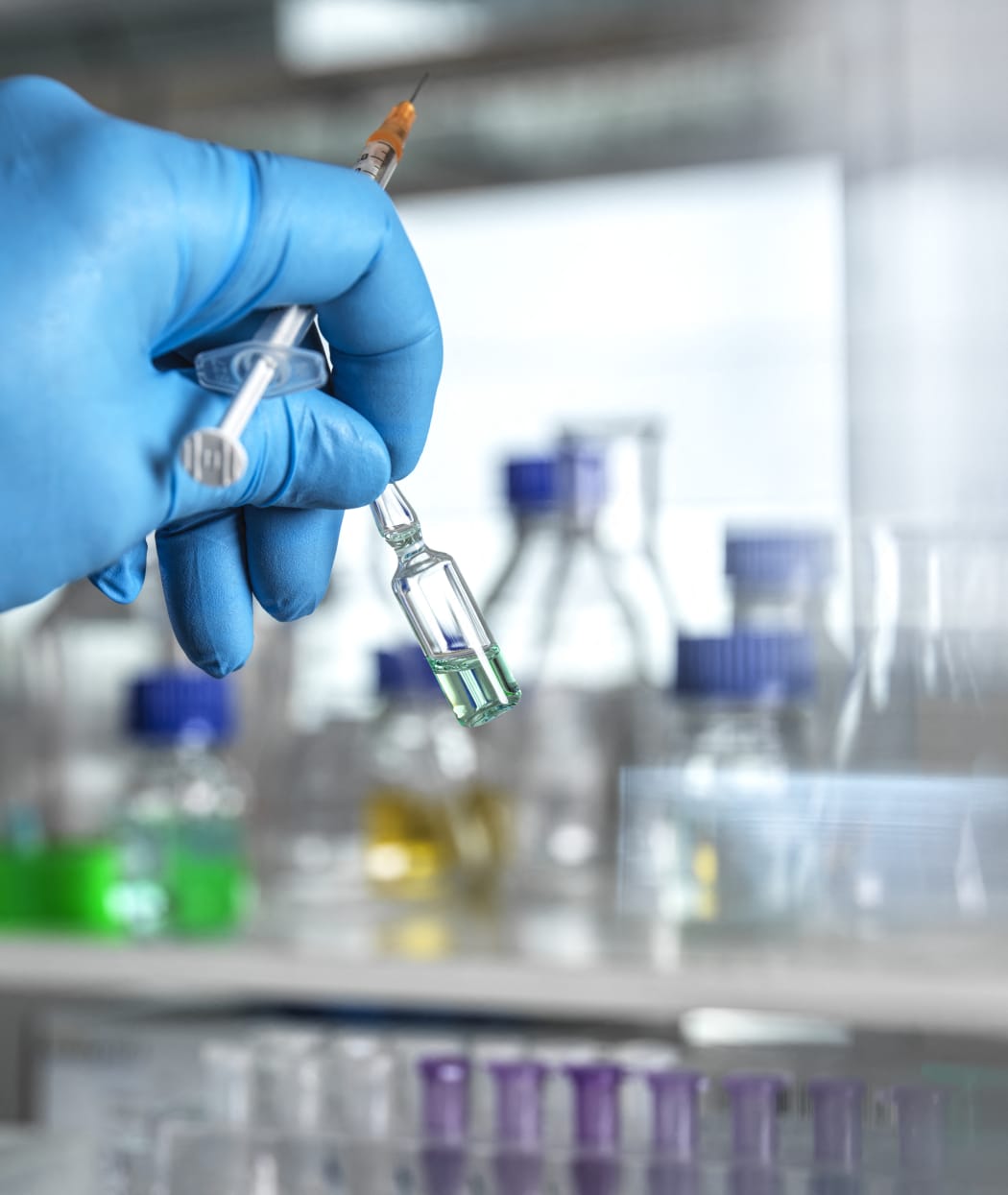 Pharmaceutical research Scientist developing a new drug or vaccine in the lab.