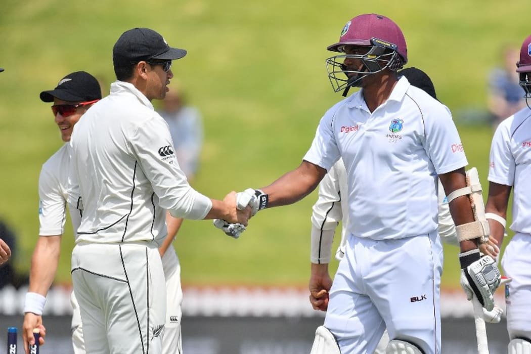 West Indies' Shannon Gabriel shakes hands with New Zealand's Ross Taylor after New Zealand's win during day four of the first Test cricket match.