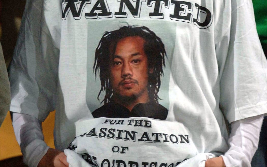 A Lions fan with a T-shirt depicting the tackle by New Zealand captain Tana Umaga on Brian O'Driscoll.