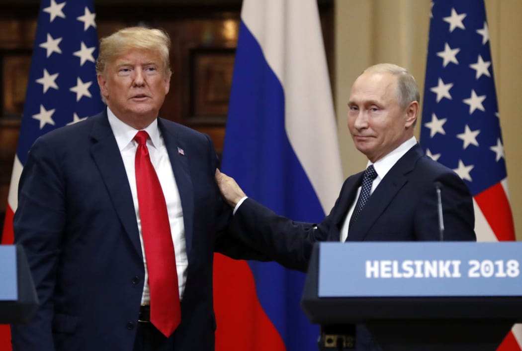 President of Russia Vladimir Putin and President of the US Donald Trump, left, during the joint news conference following their meeting in Helsinki.